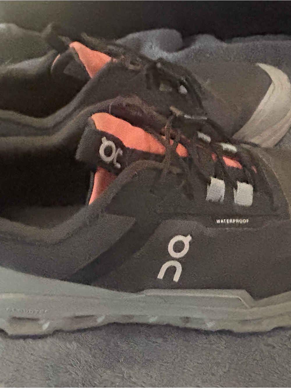 On Clouds Sneakers in Black with Coral Accents